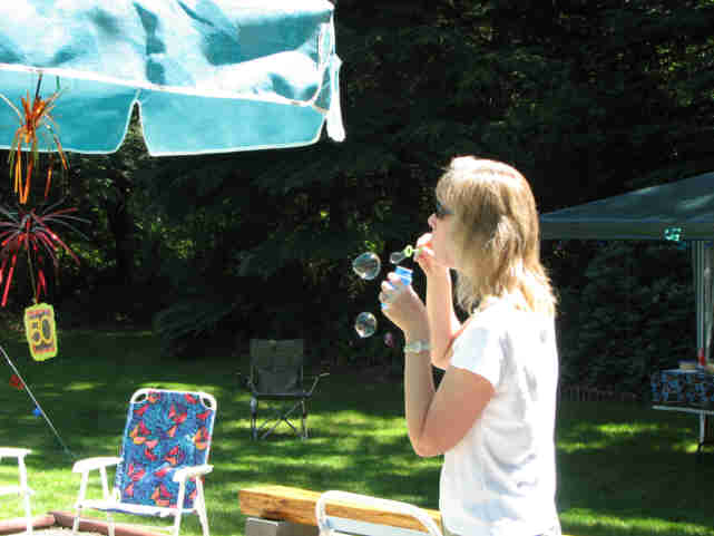 karen blowing bubbles
